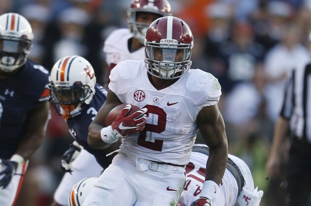 Alabama running back Derrick Henry (2) runs the ball during an NCAA college football game against Alabama, Saturday, Nov. 28, 2015, in Auburn, Ala. (AP Photo/Butch Dill)