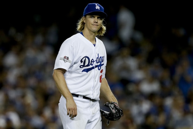 Los Angeles Dodgers starting pitcher Zack Greinke reacts as he leaves the game during the seventh inning in Game 5 of baseball's National League Division Series against the New York Mets Thursday, Oct. 15, 2015, in Los Angeles. (AP Photo/Alex Gallardo)