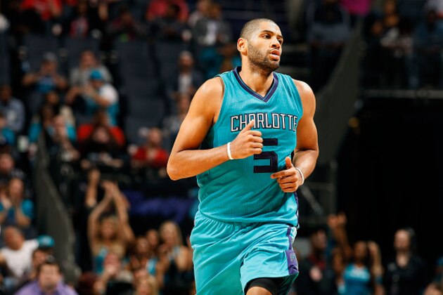 CHARLOTTE, NC - NOVEMBER 29: Nicolas Batum #5 of the Charlotte Hornets looks on during the game against the Milwaukee Bucks on November 29, 2015 at Time Warner Cable Arena in Charlotte, North Carolina. NOTE TO USER: User expressly acknowledges and agrees that, by downloading and or using this photograph, User is consenting to the terms and conditions of the Getty Images License Agreement.  Mandatory Copyright Notice:  Copyright 2015 NBAE (Photo by Kent Smith/NBAE via Getty Images)