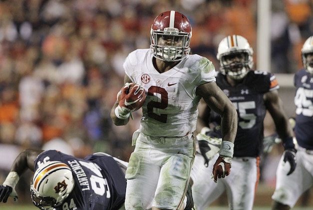 Nov 28, 2015; Auburn, AL, USA; Alabama Crimson Tide running back Derrick Henry (2) races past Auburn Tigers defenders and scores a touchdown in the fourth quarter to beat the Auburn Tigers 29-13 Jordan Hare Stadium. Mandatory Credit: John Reed-USA TODAY Sports