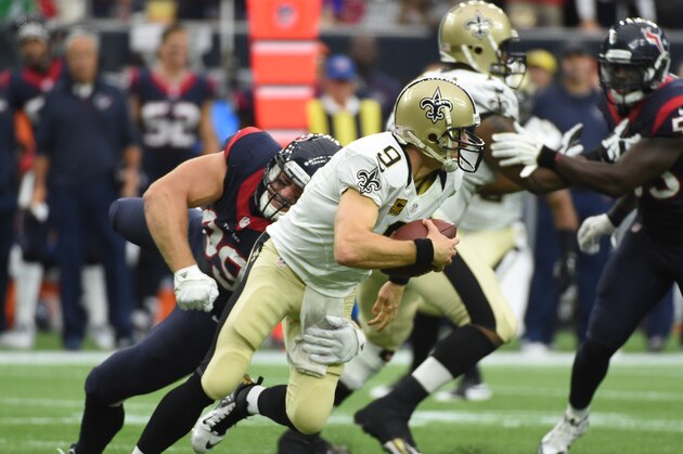 Houston Texans defensive end J.J. Watt (99) stretches to sack New Orleans Saints quarterback Drew Brees (9) during the second quarter of an NFL football game, Sunday, Nov. 29, 2015, in Houston. (AP Photo/Eric Christian Smith)