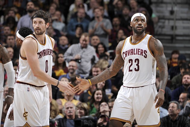 CLEVELAND, OH - NOVEMBER 28: LeBron James #23 and Kevin Love #0 of the Cleveland Cavaliers high five each other during the game against the Brooklyn Nets on November 28, 2015 at Quicken Loans Arena in Cleveland, Ohio.  NOTE TO USER: User expressly acknowledges and agrees that, by downloading and or using this Photograph, user is consenting to the terms and conditions of the Getty Images License Agreement. Mandatory Copyright Notice: Copyright 2015 NBAE (Photo by David Liam Kyle/NBAE via Getty Images)