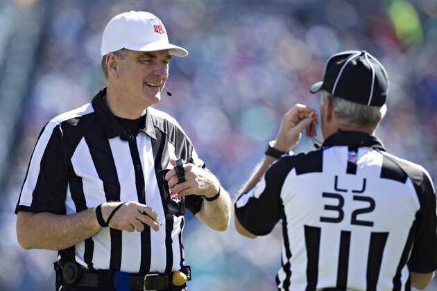 NASHVILLE, TN - OCTOBER 18:  Referee Jeff Triplette and Line Judge Jeff Bergman talk during a game between the Tennessee Titans and the Miami Dolphins at LP Field on October 18, 2015 in Nashville, Tennessee.  The Dolphins defeated the Titans 38-10.  (Photo by Wesley Hitt/Getty Images)