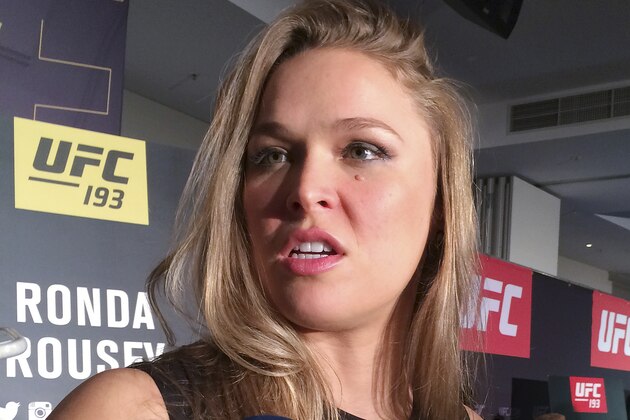Ronda Rousey of the U.S. talks about her upcoming UFC bantamweight title match against Holly Holm in Melbourne, Australia, Friday, Nov. 13, 2015. Just eight months after Australia’s Victoria state lifted its ban on cage fighting, the UFC has brought its showcase UFC 193 event Down Under, with the Rousey-Holm fight as its main event. (AP Photo Neil Frankland)