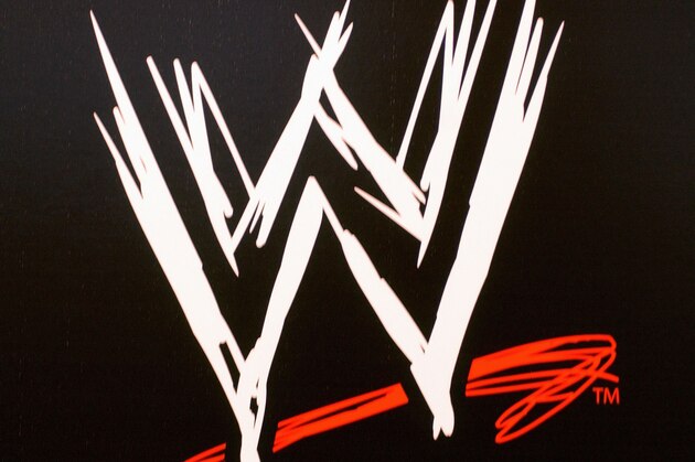 NEW YORK - MARCH 18:  The World Wrestling Entertainment logo hangs on a wall at a media conference announcing the all-star lineup of WWE WrestleMania XIX at ESPN Zone in Times Square March 18, 2003 in New York City.  (Photo by Mark Mainz/Getty Images)