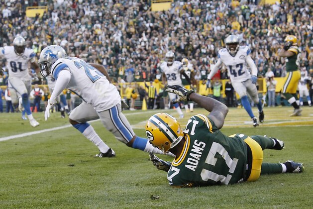 Detroit Lions players reacts after Green Bay Packers' Davante Adams can't catch a two-point conversion during the second half of an NFL football game Sunday, Nov. 15, 2015, in Green Bay, Wis. The Lions won 18-16. (AP Photo/Morry Gash)