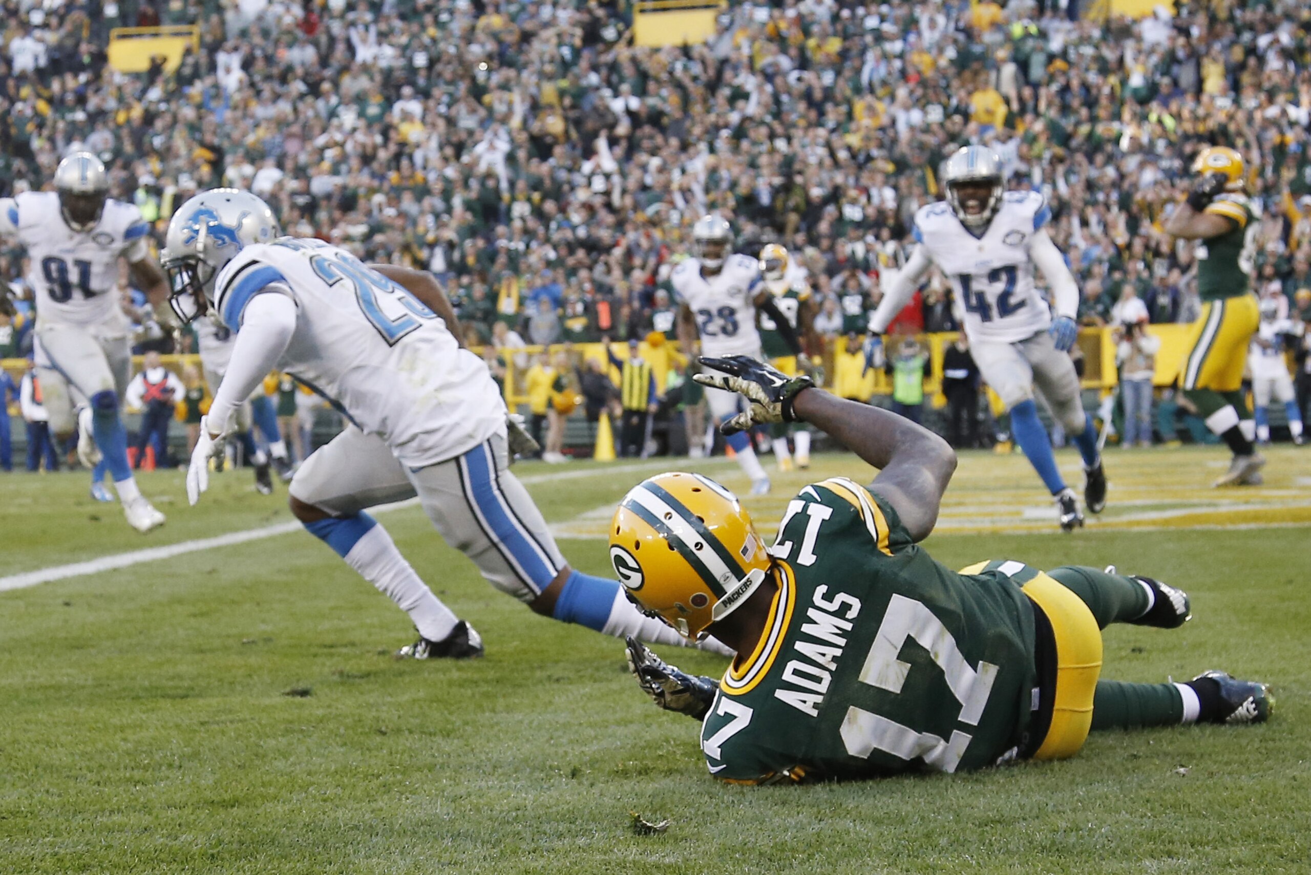 Detroit Lions players reacts after Green Bay Packers' Davante Adams can't catch a two-point conversion during the second half of an NFL football game Sunday, Nov. 15, 2015, in Green Bay, Wis. The Lions won 18-16. (AP Photo/Morry Gash)