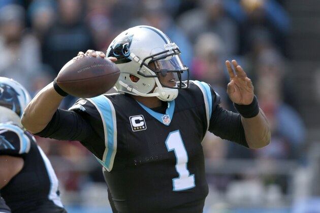 Carolina Panthers' Cam Newton (1) looks to pass against the Washington Redskins in the first half of an NFL football game in Charlotte, N.C., Sunday, Nov. 22, 2015. (AP Photo/Bob Leverone)