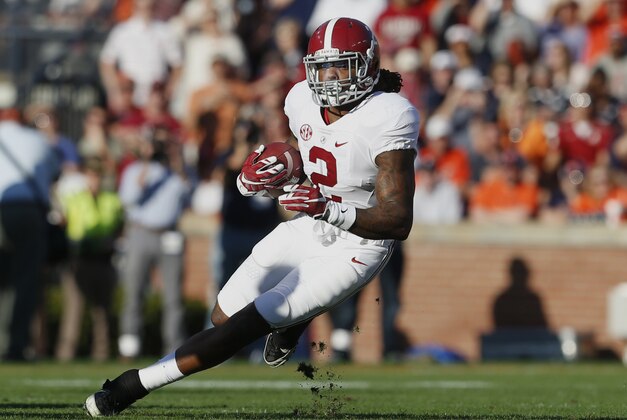 Alabama running back Derrick Henry (2) runs the ball during an NCAA college football game against Auburn, Saturday, Nov. 28, 2015, in Auburn, Ala. Alabama won 29-13. (AP Photo/Butch Dill)