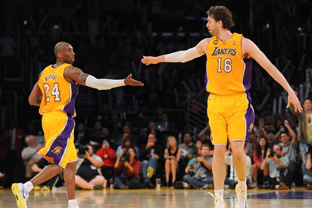 LOS ANGELES, CA - APRIL 5: Kobe Bryant #24 and Pau Gasol #16 of the Los Angeles Lakers celebrate in a game against the Memphis Grizzlies at Staples Center on April 5, 2013 in Los Angeles, California. NOTE TO USER: User expressly acknowledges and agrees that, by downloading and/or using this Photograph, user is consenting to the terms and conditions of the Getty Images License Agreement. Mandatory Copyright Notice: Copyright 2013 NBAE (Photo by Noah Graham/NBAE via Getty Images)