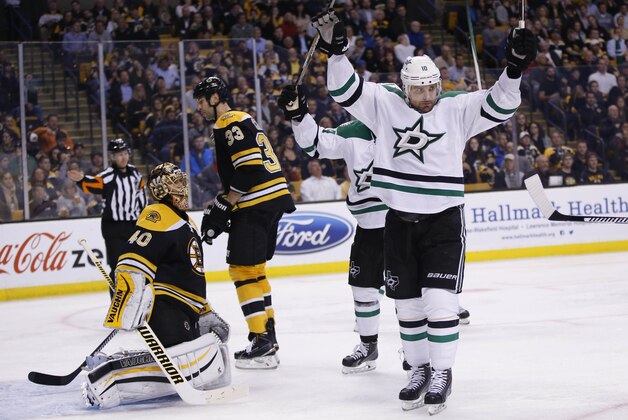 Nov 3, 2015; Boston, MA, USA; Dallas Stars left wing Patrick Sharp (10) celebrates after center Tyler Seguin (not pictured) scored a goal on Boston Bruins goalie Tuukka Rask (40) during the second period at TD Garden. Mandatory Credit: Greg M. Cooper-USA TODAY Sports