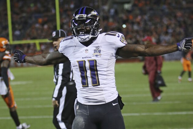 Baltimore Ravens wide receiver Kamar Aiken celebrates after scoring a 15-yard touchdown in the second half of an NFL football game against the Cleveland Browns, Monday, Nov. 30, 2015, in Cleveland. (AP Photo/Ron Schwane)