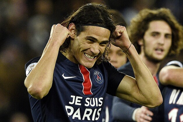 Paris Saint-Germain's Uruguyan forward Edinson Cavani celebrates after scoring a goal during the French L1 football match between Paris Saint-Germain (PSG) and Troyes at the Parc des Princes stadium in Paris on November 28, 2015. AFP PHOTO / FRANCK FIFE / AFP / FRANCK FIFE        (Photo credit should read FRANCK FIFE/AFP/Getty Images)