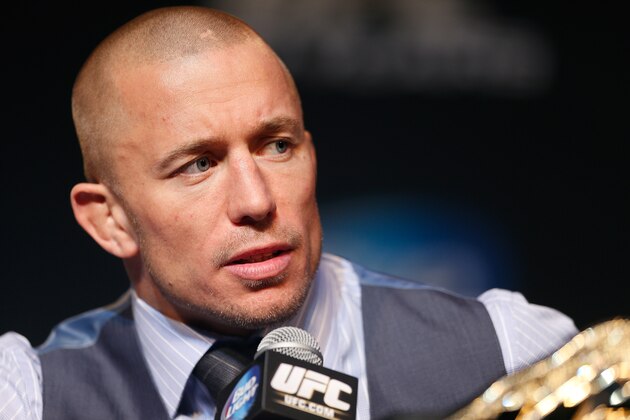 LAS VEGAS, NV - NOVEMBER 14: UFC welterweight champion Georges St-Pierre interacts with media during the final UFC 167 pre-fight press conference inside the Hollywood Theatre at the MGM Grand Hotel/Casino on November 14, 2013 in Las Vegas, Nevada. (Photo by Josh Hedges/Zuffa LLC/Zuffa LLC via Getty Images)