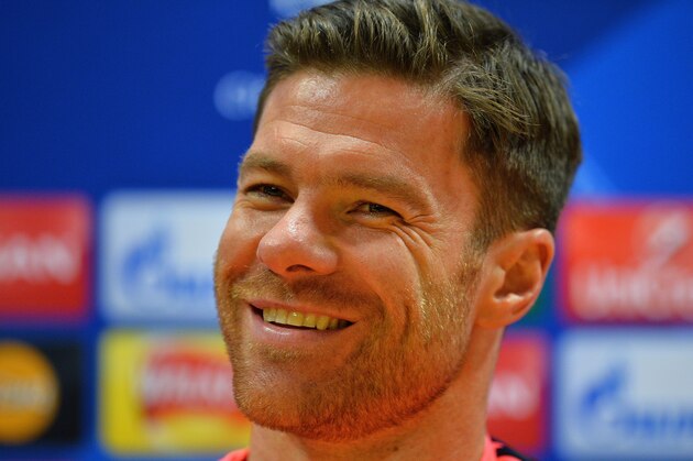 Bayern Munich's Spain defender Xabi Alonso attends a press conference / attends a training session at the Emirates Stadium in London, on October 19, 2015, on the eve of their UEFA Champions League group stage F football match against Arsenal.  AFP PHOTO / GLYN KIRK        (Photo credit should read GLYN KIRK/AFP/Getty Images)