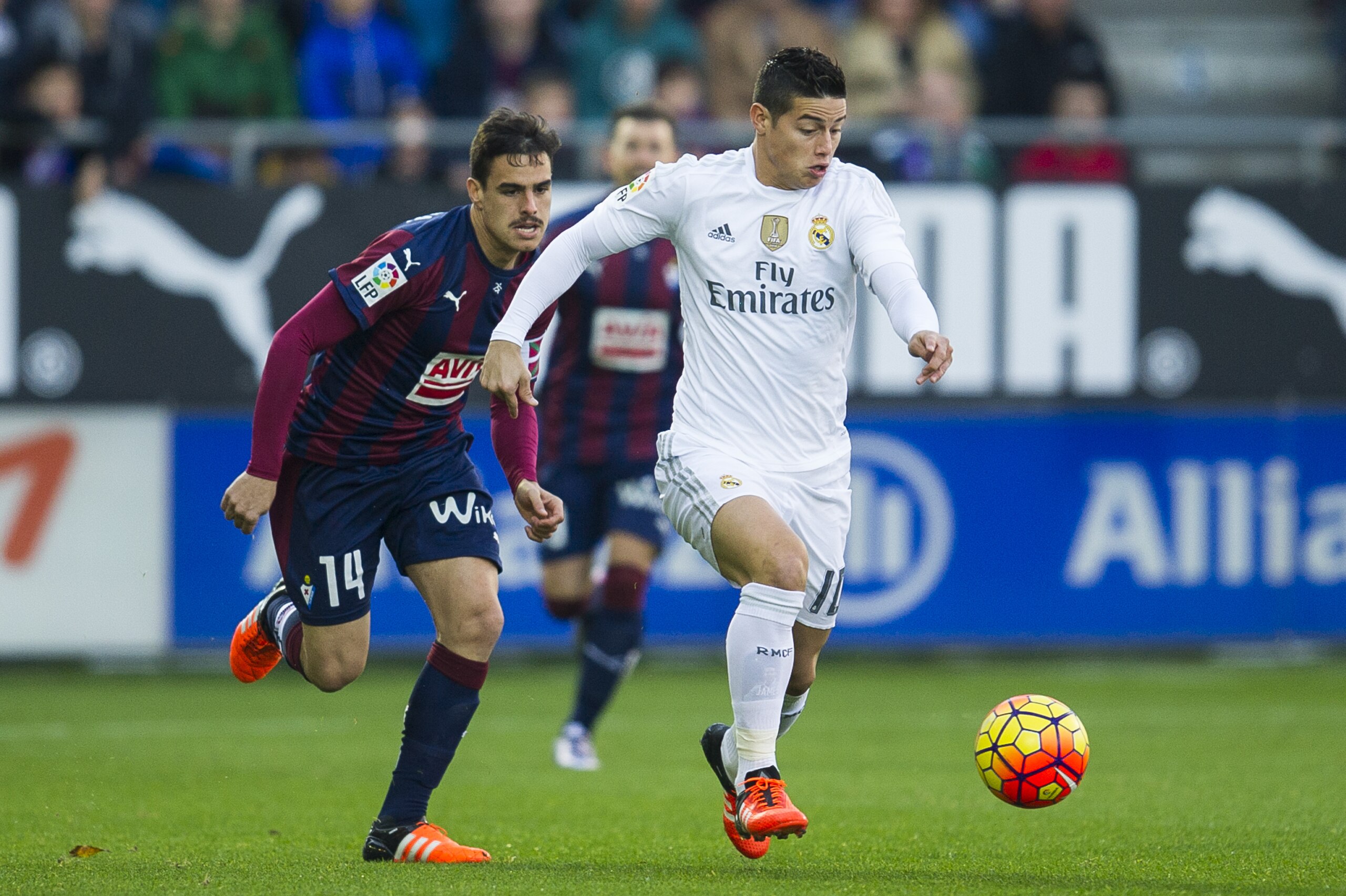 EIBAR, SPAIN - NOVEMBER 29: James Rodriguez of Real Madrid duels for the ball with Daniel Garcia of SD Eibar during the La Liga match between SD Eibar and Real Madrid at Ipurua Municipal Stadium on November 29, 2015 in Eibar, Spain.  (Photo by Juan Manuel Serrano Arce/Getty Images)