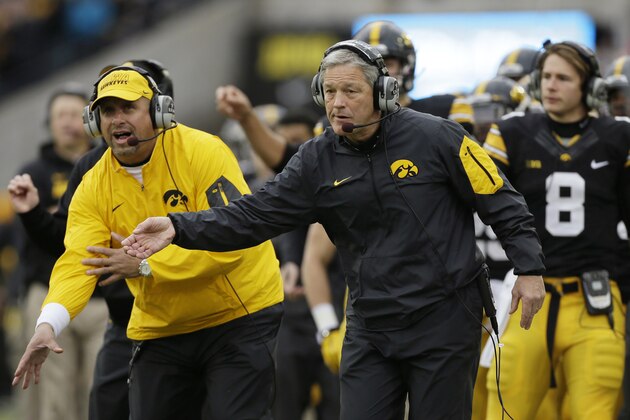 Iowa head coach Kirk Ferentz directs his team during the first half of an NCAA college football game against Maryland, Saturday, Oct. 31, 2015, in Iowa City, Iowa. Iowa won 31-15. (AP Photo/Charlie Neibergall)