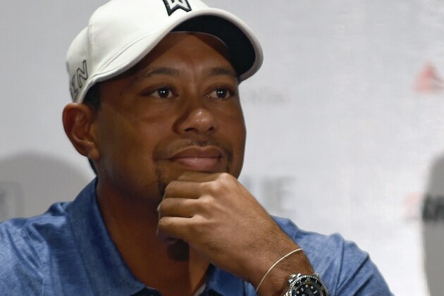 US golfer Tiger Woods attends a press conference at the Presidente Interncontinental Hotel in Mexico City on October 20, 2015. Woods is in Mexico to promote the Bridgestone America's Golf Cup. AFP PHOTO/ALFREDO ESTRELLA        (Photo credit should read ALFREDO ESTRELLA/AFP/Getty Images)