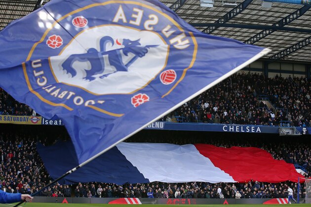 The French flag is displayed ahead of the English Premier League football match between Chelsea and Norwich City at Stamford Bridge in London on November 21, 2015. AFP PHOTO / JUSTIN TALLIS 

RESTRICTED TO EDITORIAL USE. No use with unauthorized audio, video, data, fixture lists, club/league logos or 'live' services. Online in-match use limited to 75 images, no video emulation. No use in betting, games or single club/league/player publications.        (Photo credit should read JUSTIN TALLIS/AFP/Getty Images)