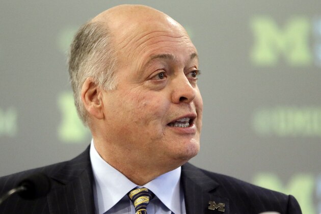 Michigan interim athletic director Jim Hackett addresses the media before introducing Jim Harbaugh as the new head coach of Michigan in Ann Arbor, Mich., Tuesday, Dec. 30, 2014. (AP Photo/Carlos Osorio) Michigan interim athletic director Jim Hackett addresses the media before introducing Jim Harbaugh as the new head coach of Michigan in Ann Arbor, Mich., Tuesday, Dec. 30, 2014. (AP Photo/Carlos Osorio)