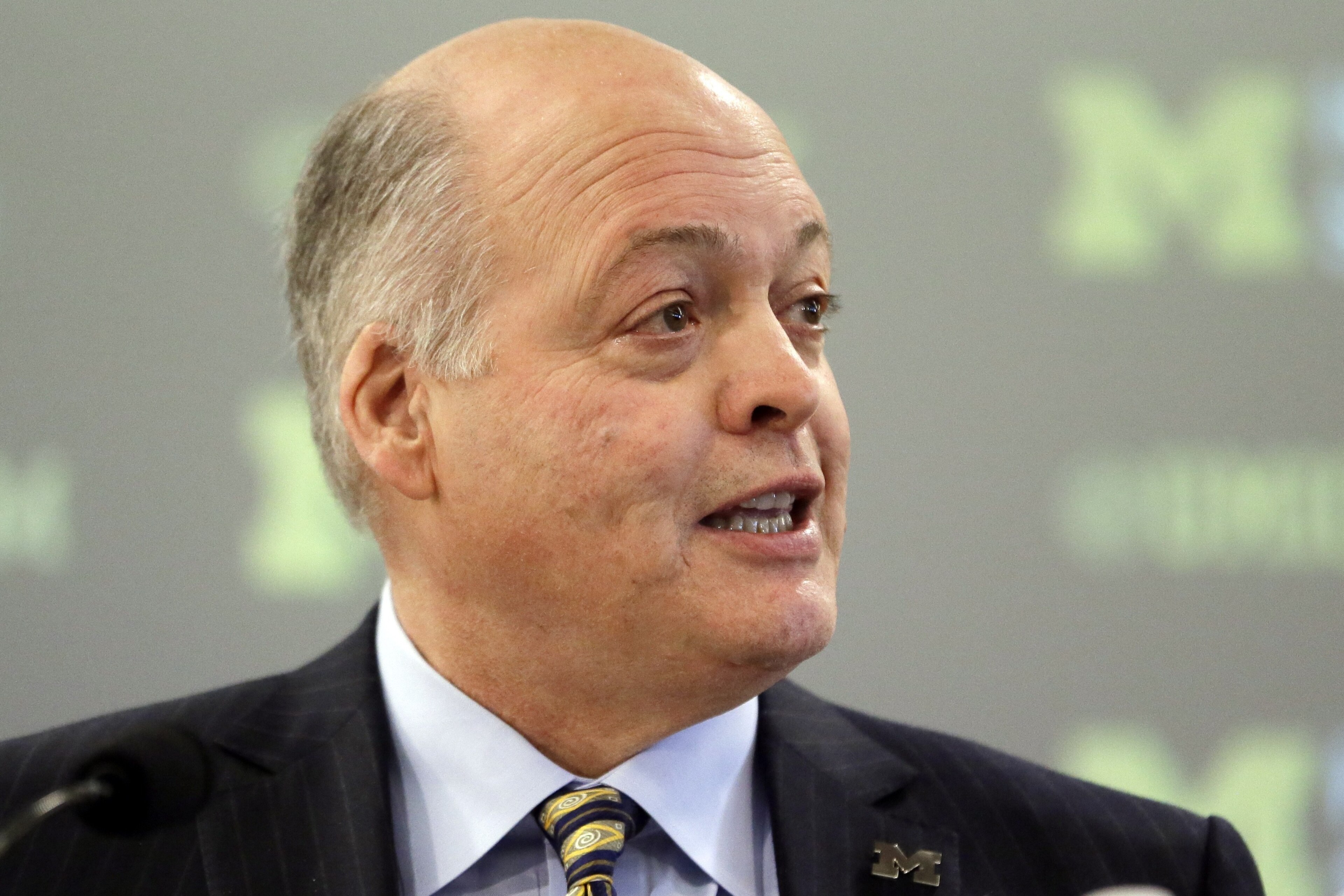 Michigan interim athletic director Jim Hackett addresses the media before introducing Jim Harbaugh as the new head coach of Michigan in Ann Arbor, Mich., Tuesday, Dec. 30, 2014. (AP Photo/Carlos Osorio) Michigan interim athletic director Jim Hackett addresses the media before introducing Jim Harbaugh as the new head coach of Michigan in Ann Arbor, Mich., Tuesday, Dec. 30, 2014. (AP Photo/Carlos Osorio)