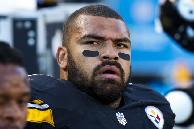 Pittsburgh Steelers defensive end Cameron Heyward (97) sits on the sidelines during an NFL football game against the Oakland Raiders , Sunday, Nov. 8, 2015, in Pittsburgh. (AP Photo/Gene J. Puskar)