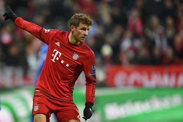 Bayern Munich's striker Thomas Mueller reacts after the third goal during the UEFA Champions League Group F football match between FCB Bayern Munich and Olympiakos Piraeus on November 24, 2015 at the 'Allianz Arena' in Munich, southern Germany. AFP PHOTO / CHRISTOF STACHE / AFP / CHRISTOF STACHE        (Photo credit should read CHRISTOF STACHE/AFP/Getty Images)