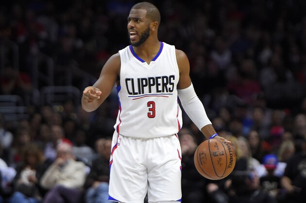 Los Angeles Clippers guard Chris Paul dribbles during the first half of an NBA basketball game against the Minnesota Timberwolves, Sunday, Nov. 29, 2015, in Los Angeles. (AP Photo/Mark J. Terrill)