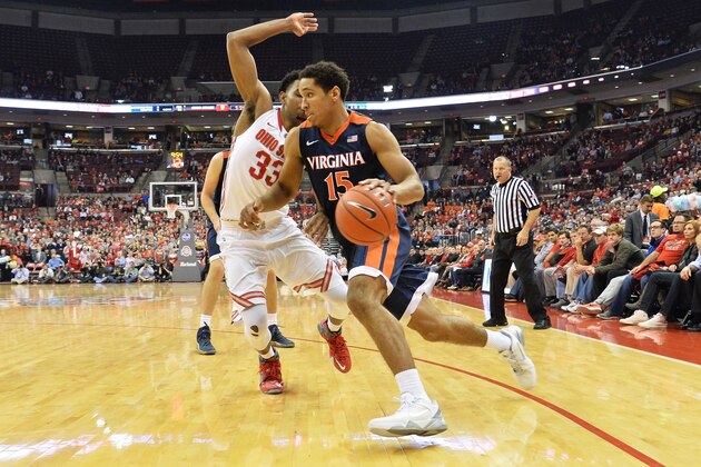 COLUMBUS, OH - DECEMBER 1: Malcolm Brogdon #15 of the Virginia Cavaliers drives the baseline as Keita Bates-Diop #33 of the Ohio State Buckeyes defends in the first half on December 1, 2015 at Value City Arena in Columbus, Ohio. (Photo by Jamie Sabau/Getty Images) COLUMBUS, OH - DECEMBER 1: Malcolm Brogdon #15 of the Virginia Cavaliers drives the baseline as Keita Bates-Diop #33 of the Ohio State Buckeyes defends in the first half on December 1, 2015 at Value City Arena in Columbus, Ohio. (Photo by Jamie Sabau/Getty Images)
