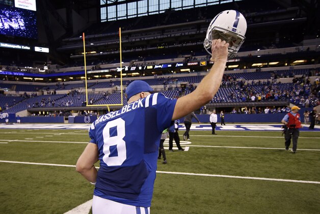 Nov 29, 2015; Indianapolis, IN, USA; Indianapolis Colts quarterback Matt Hasselbeck (8) salutes the fans by raising his helmet as he runs off the field after the game against the Tampa Bay Buccaneers at Lucas Oil Stadium. Indianapolis defeats Tampa Bay 25-12. Mandatory Credit: Brian Spurlock-USA TODAY Sports