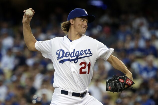 Los Angeles Dodgers starting pitcher Zack Greinke throws to the New York Mets during the first inning in Game 2 of baseball's National League Division Series, Saturday, Oct. 10, 2015 in Los Angeles. (AP Photo/Lenny Ignelzi)