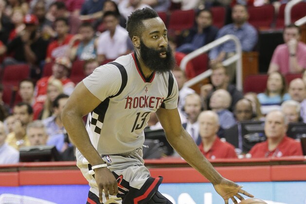 Houston Rockets guard James Harden (13) hurries the ball up the court in the second half of an NBA basketball game Wednesday, Nov. 25, 2015 in Houston. Memphis won 102-93. (AP Photo/Bob Levey)