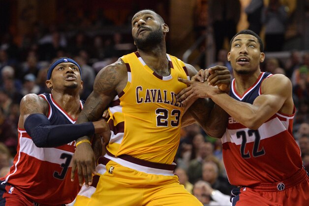 Dec 1, 2015; Cleveland, OH, USA; Washington Wizards guard Bradley Beal (3), Cleveland Cavaliers forward LeBron James (23) and Wizards forward Otto Porter Jr. (22) battle for position during the fourth quarter at Quicken Loans Arena. The Wizards won 97-85. Mandatory Credit: Ken Blaze-USA TODAY Sports
