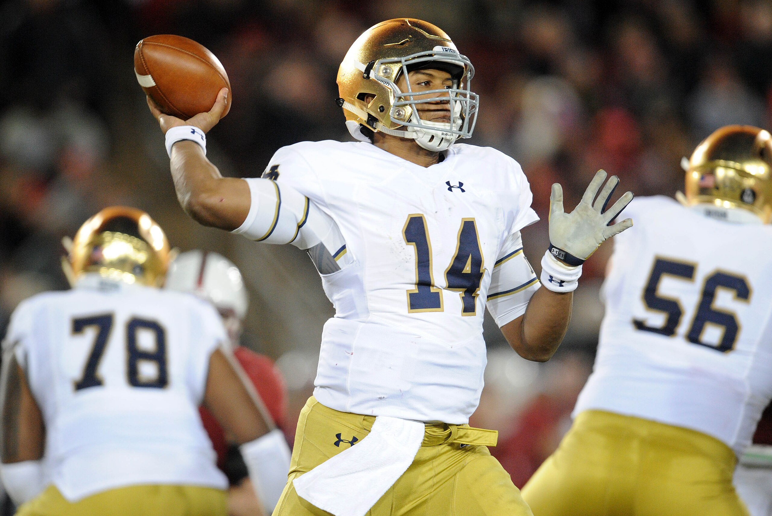November 28, 2015; Stanford, CA, USA; Notre Dame Fighting Irish quarterback DeShone Kizer (14) throws against Stanford Cardinal during the second half at Stanford Stadium. Mandatory Credit: Gary A. Vasquez-USA TODAY Sports