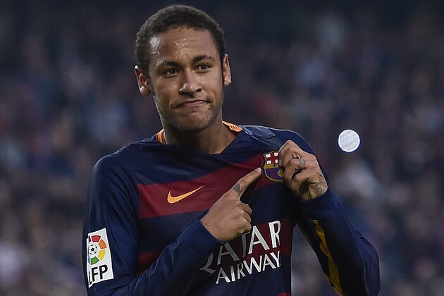 Barcelona's Brazilian forward Neymar da Silva Santos Junior celebrates his goal during the Spanish league football match FC Barcelona vs Villarreal CF at the Camp Nou stadium in Barcelona on November 8, 2015.   AFP PHOTO/ JOSEP LAGO        (Photo credit should read JOSEP LAGO/AFP/Getty Images)
