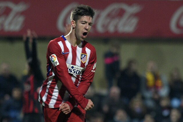 Atletico Madrid's Argentinian forward Luciano Vietto celebrates after scoring a goal during the Spanish Copa del Rey (King's Cup) football match CF Reus Deportiu vs Club Atletico de Madrid at the Estadi Municipal de Reus in Reus on December 1, 2015. / AFP / LLUIS GENE        (Photo credit should read LLUIS GENE/AFP/Getty Images)