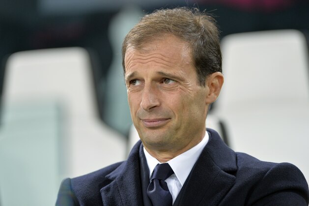 Juventus headcoach Massimiliano Allegri waits for the start of  the Champions League, group D soccer match between Juventus and Borussia Moenchengladbach at the Juventus Stadium in Turin, Italy, Wednesday, Oct. 21, 2015. (AP Photo/Massimo Pinca)