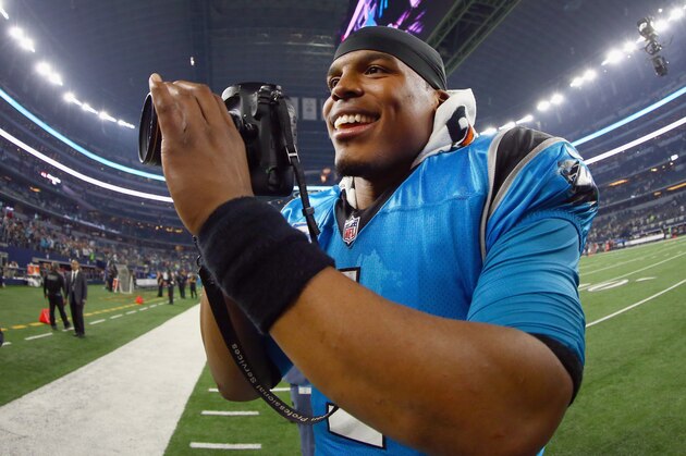 ARLINGTON, TX - NOVEMBER 26:  Cam Newton #1 of the Carolina Panthers celebrates after beating the Dallas Cowboys 33-14 at AT&T Stadium on November 26, 2015 in Arlington, Texas.  (Photo by Tom Pennington/Getty Images)