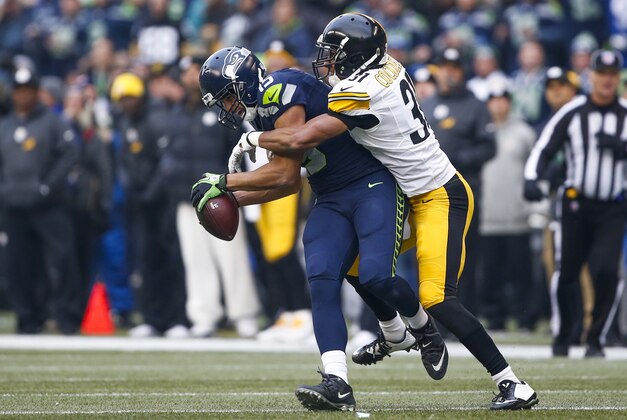 Nov 29, 2015; Seattle, WA, USA; Seattle Seahawks wide receiver Jermaine Kearse (15) catches a pass while under coverage from Pittsburgh Steelers defensive back Ross Cockrell (31) during the second quarter at CenturyLink Field. Mandatory Credit: Joe Nicholson-USA TODAY Sports
