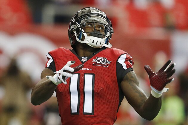 Atlanta Falcons wide receiver Julio Jones (11) warms up before the first half of an NFL football game between the Atlanta Falcons and the Minnesota Vikings, Sunday, Nov. 29, 2015, in Atlanta. (AP Photo/Butch Dill)