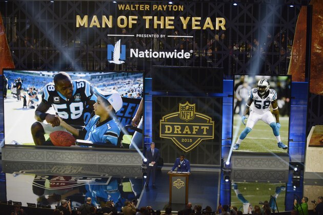 The 2014 Walter Payton Man of the Year award winner Carolina Panthers linebacker Thomas Davis speaks during the first round of the 2015 NFL Football Draft,  Thursday, April 30, 2015, in Chicago. (AP Photo/Paul Beaty)