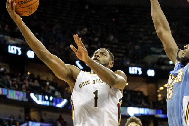 New Orleans Pelicans guard Tyreke Evans (1) drives for a layup in double overtime of an NBA basketball game against the Denver Nuggets in New Orleans, Sunday, March 15, 2015. The Nuggets won in double overtime, 118-111. (AP Photo/Scott Threlkeld)