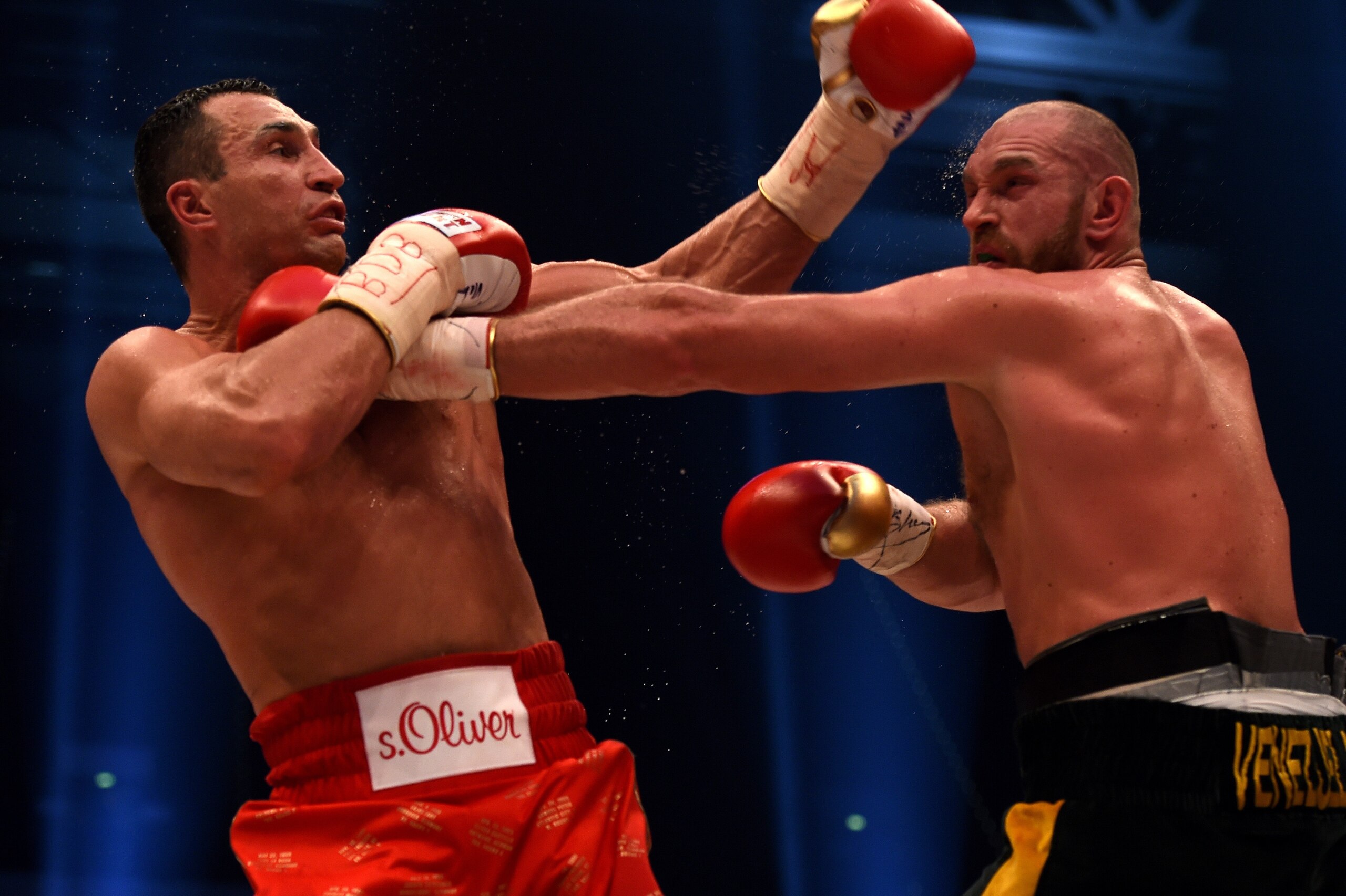World heavyweight boxing champion Wladimir Klitschko (L) of Ukraine defends against Britain's Tyson Fury during their WBA, IBF, WBO and IBO title bout in Duesseldorf, western Germany, on November 28, 2015. Fury dethroned Klitschko in a 12round decision to become world heavyweight champion. / AFP / PATRIK STOLLARZ (Photo credit should read PATRIK STOLLARZ/AFP/Getty Images) World heavyweight boxing champion Wladimir Klitschko (L) of Ukraine defends against Britain's Tyson Fury during their WBA, IBF, WBO and IBO title bout in Duesseldorf, western Germany, on November 28, 2015. Fury dethroned Klitschko in a 12round decision to become world heavyweight champion. / AFP / PATRIK STOLLARZ (Photo credit should read PATRIK STOLLARZ/AFP/Getty Images)