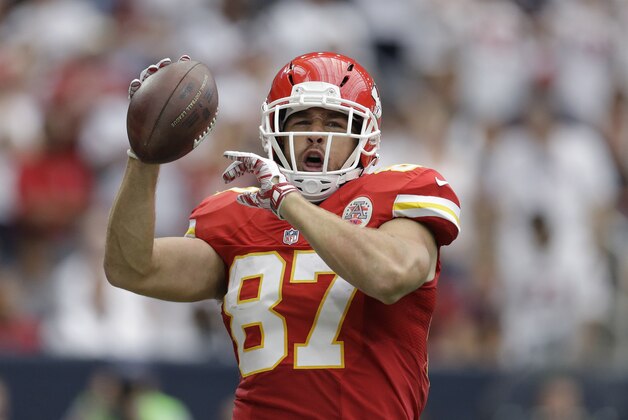 Kansas City Chiefs' Travis Kelce (87) celebrates his touchdown catch against the Houston Texans during the first half of an NFL football game Sunday, Sept. 13, 2015, in Houston. (AP Photo/Patric Schneider)