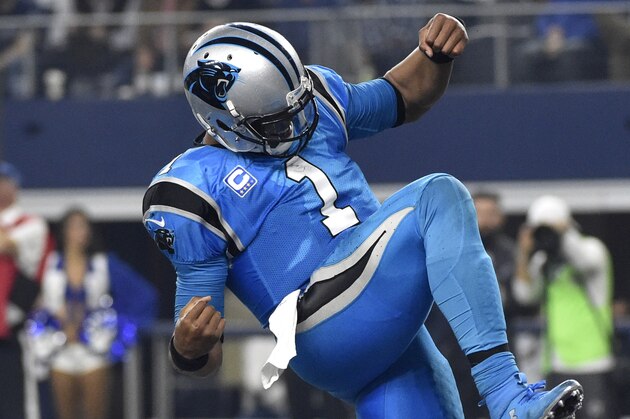 Carolina Panthers quarterback Cam Newton (1) celebrates scoring a touchdown on a run against the Dallas Cowboys in the second half of an NFL football game, Thursday, Nov. 26, 2015, in Arlington, Texas. (AP Photo/Michael Ainsworth)