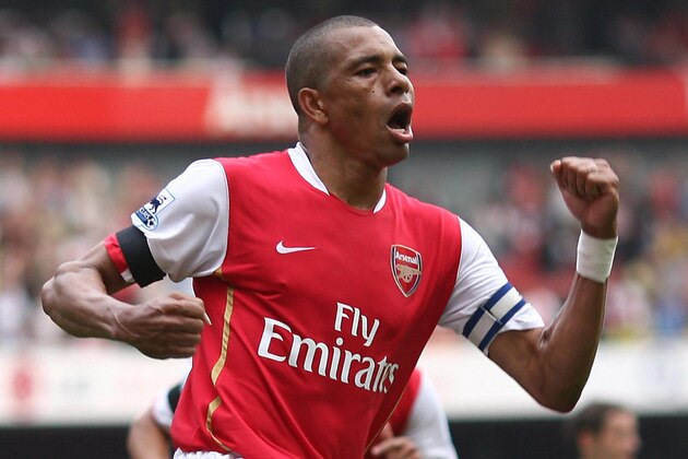 London, UNITED KINGDOM: Arsenal's Brazilian captain Gilberto Silva  celebrates scoring his side's third goal from the penalty spot,  during the English Premiership match between Arsenal and Fulham, at the Emirates Stadium, London 29 April  2007. AFP PHOTO/CHRIS YOUNG Mobile and website uses of domestic English football pictures subject to subscription of a licence with Football Association Premier League (FAPL) tel: +44 207 298 1656. For newspapers where the football content of the printed and electronic versions are identical, no licence is necessary. (Photo credit should read CHRIS YOUNG/AFP/Getty Images)