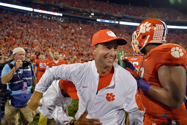 Clemson head coach Dabo Swinney celebrates after their 23-17 win over Florida State in an NCAA college football game, Saturday, Nov. 7, 2015,  in Clemson,  S.C. (AP Photo/Richard Shiro)
