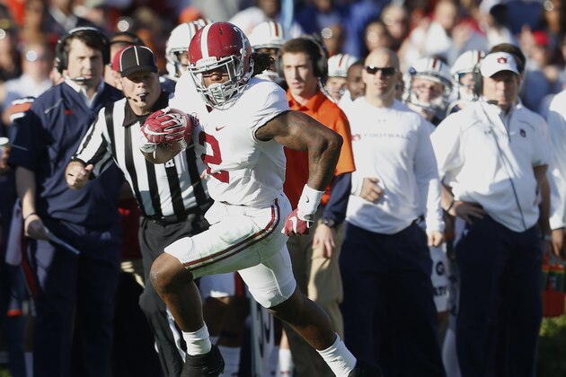 Alabama running back Derrick Henry (2) runs the ball during an NCAA college football game against Auburn, Saturday, Nov. 28, 2015, in Auburn, Ala. (AP Photo/Butch Dill)