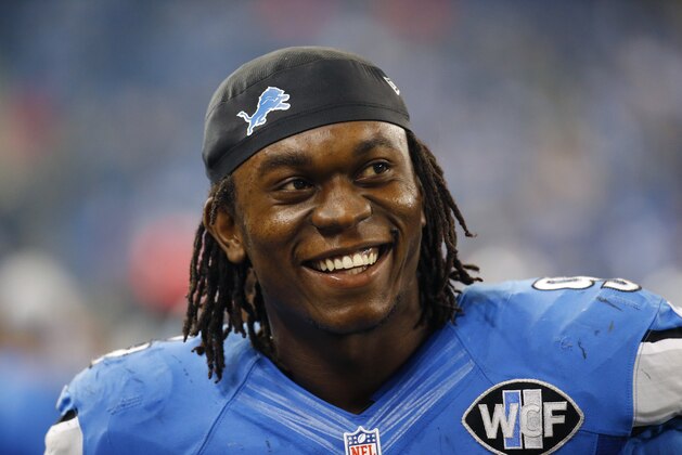 Detroit Lions defensive end Ezekiel Ansah is seen in the bench area during the second half of an NFL football game against the Philadelphia Eagles, Thursday, Nov. 26, 2015, in Detroit. The Lions defeated the Eagles 45-14. (AP Photo/Paul Sancya)