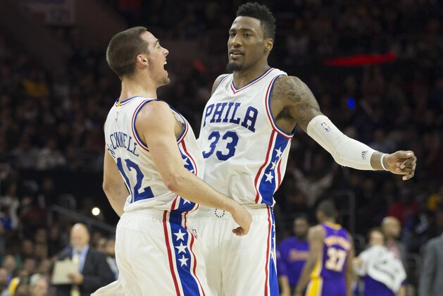 PHILADELPHIA, PA - DECEMBER 1: T.J. McConnell #12 and Robert Covington #33 of the Philadelphia 76ers react in the game against the Los Angeles Lakers on December 1, 2015 at the Wells Fargo Center in Philadelphia, Pennsylvania. NOTE TO USER: User expressly acknowledges and agrees that, by downloading and or using this photograph, User is consenting to the terms and conditions of the Getty Images License Agreement. The 76ers defeated the Lakers 103-91. (Photo by Mitchell Leff/Getty Images)